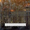 Loose helium balloons gold black white
