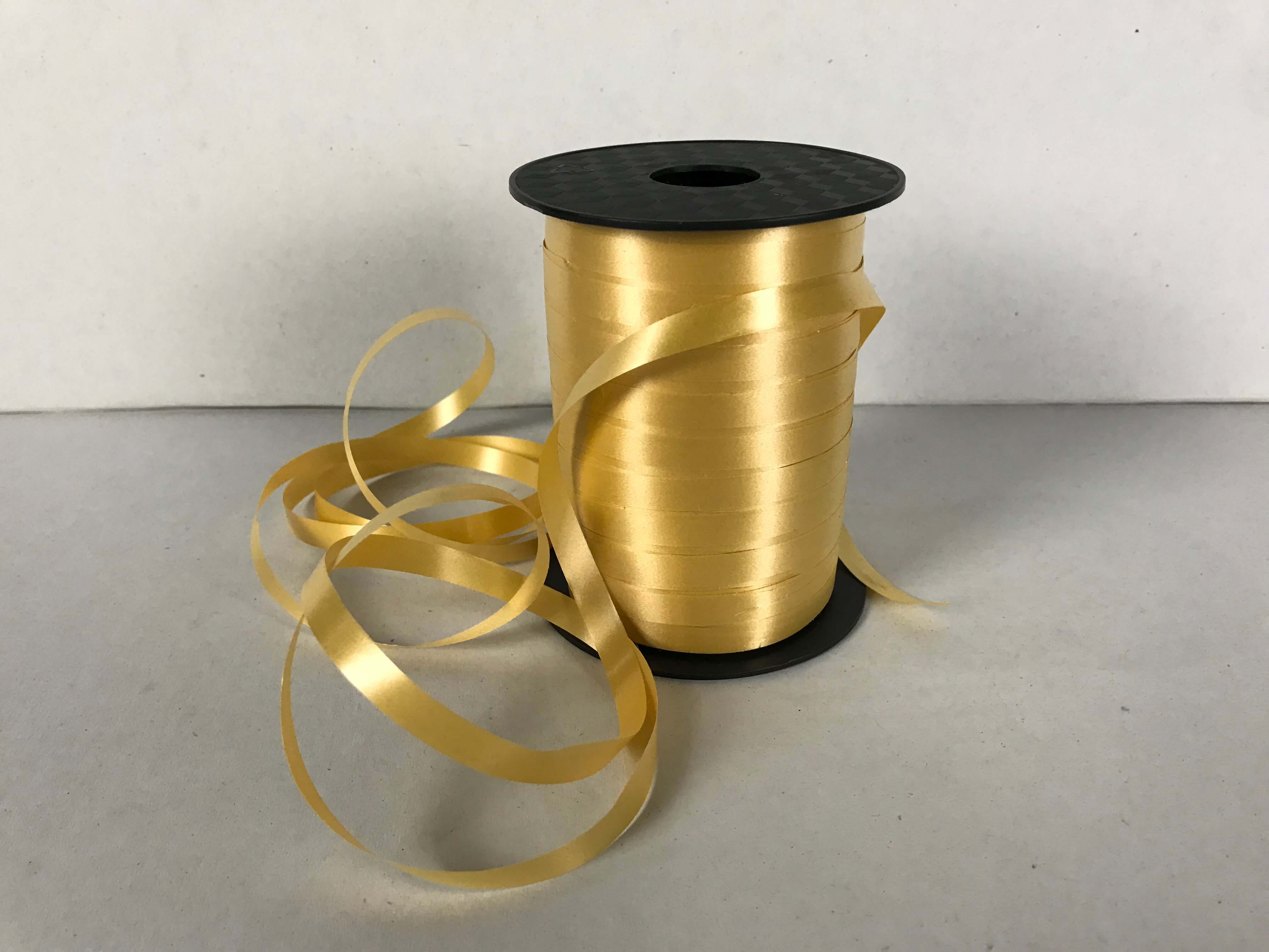 Gold curling ribbon 8mm wide in a 250 metre roll for helium balloons.