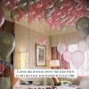 Loose helium balloons pink white and silver